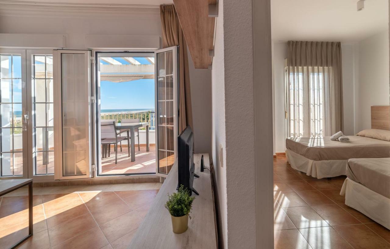 Apartamentos Costaluz Las Dunas Isla Canela Exteriör bild